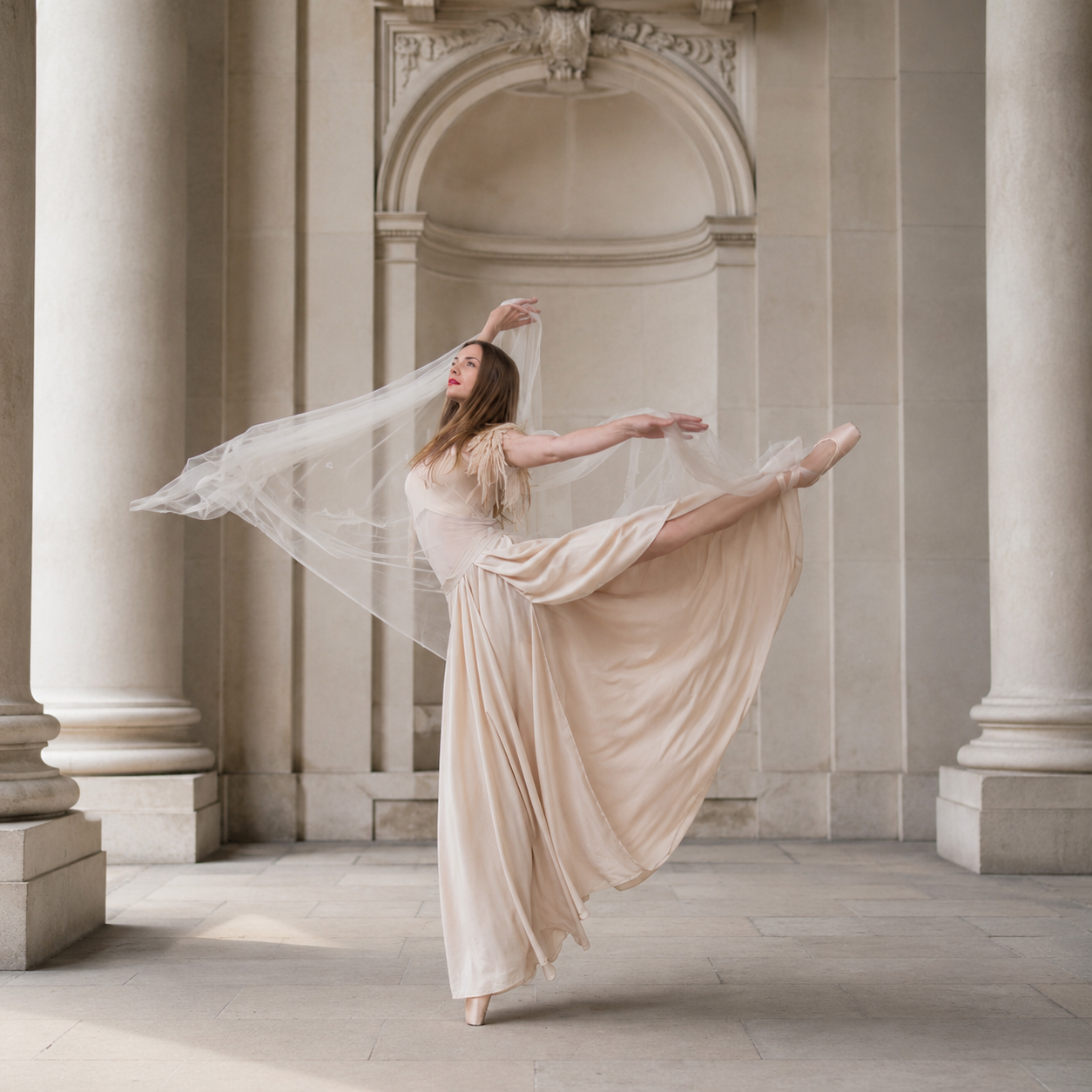 Ballet dancer in a flowing cream costume